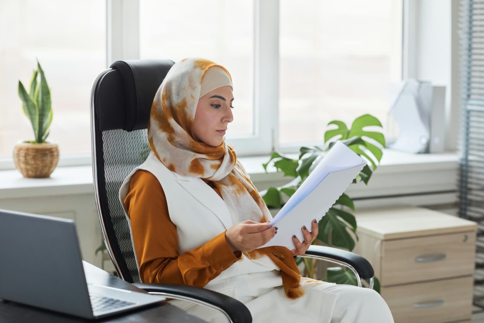A woman reading documents
